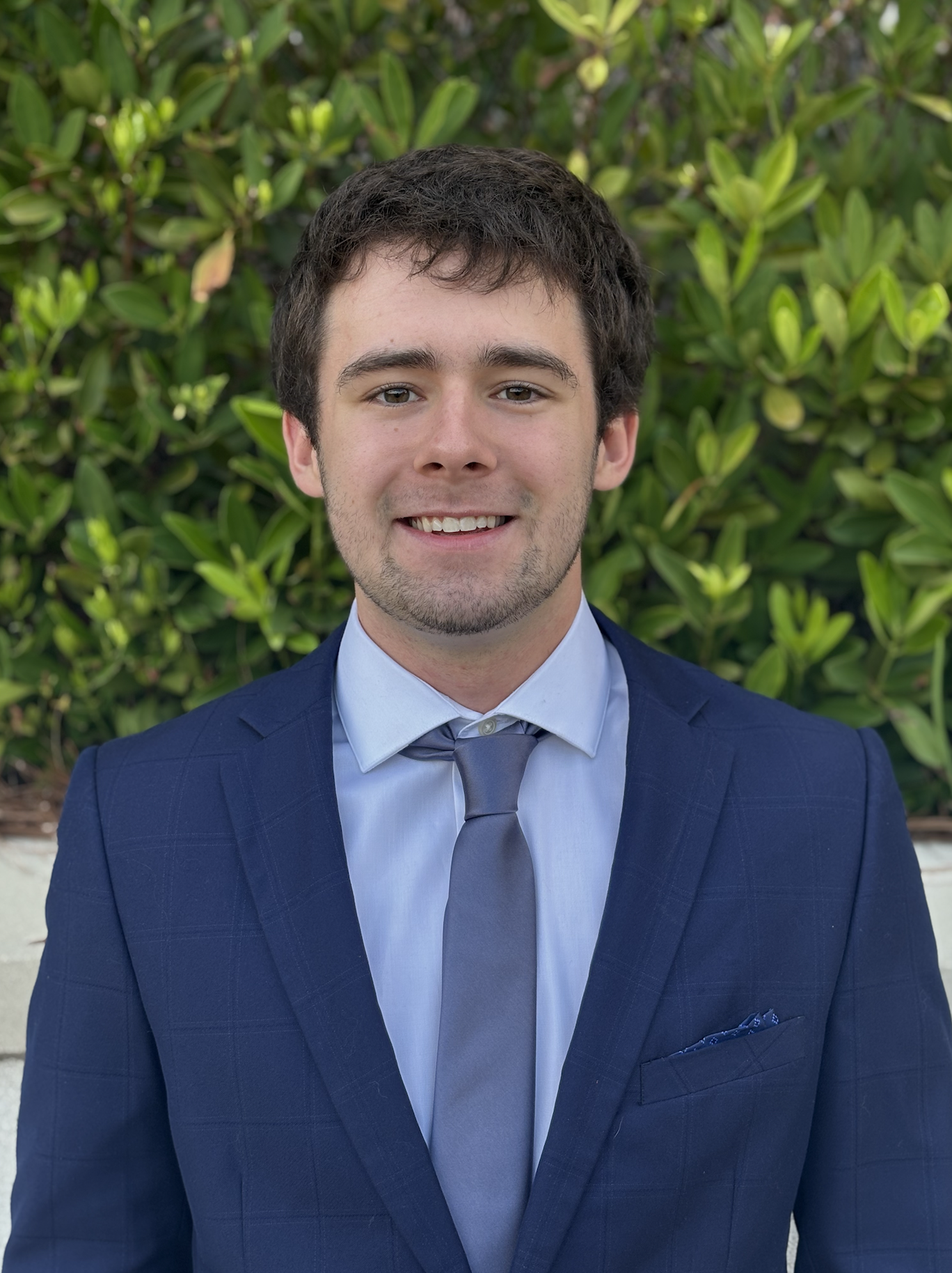 Symposium Headshot.png